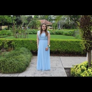 Size 12 blue gown. Only worn one time!